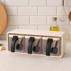 kitchen masala organizer with three transparent spice boxes