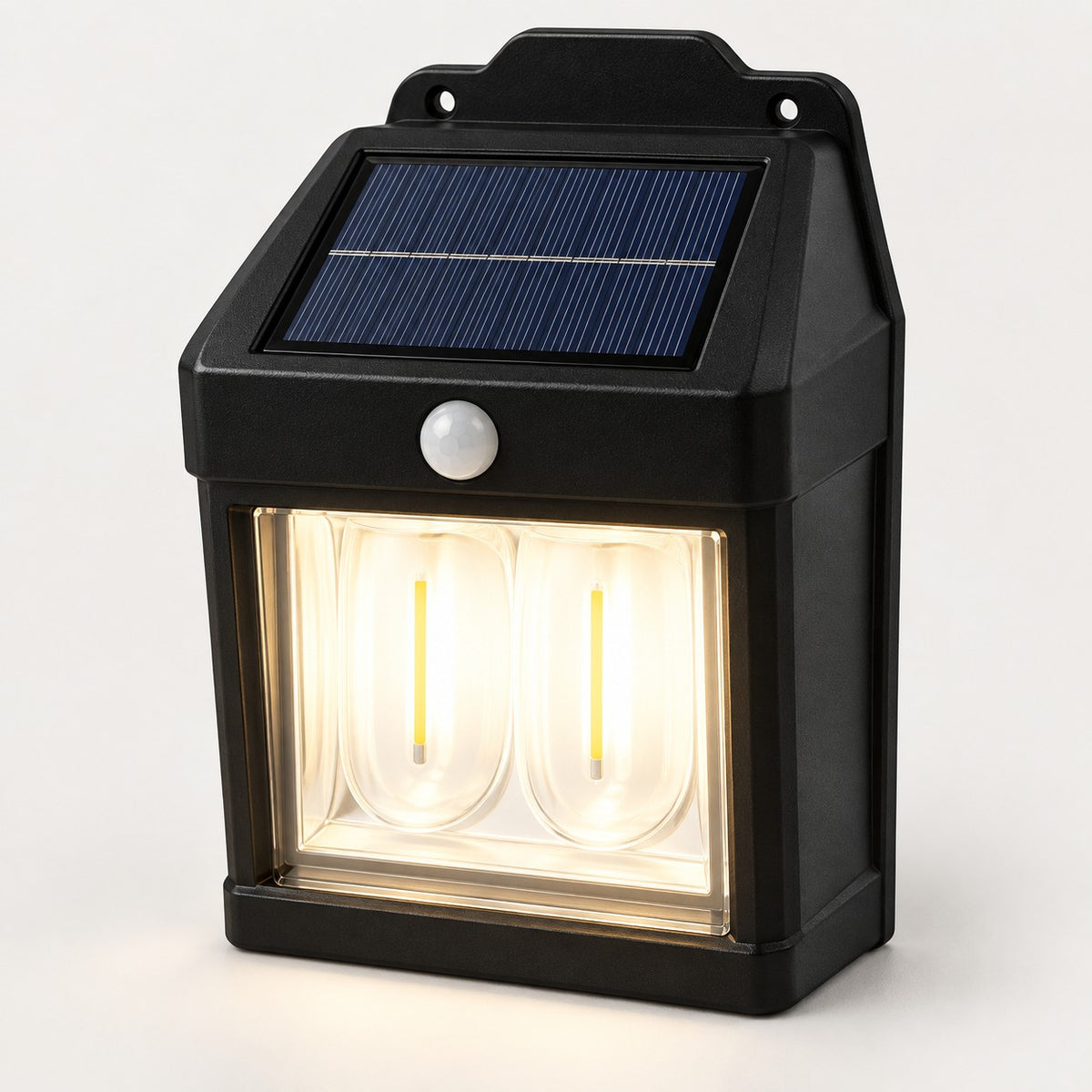 Close-up of a solar wall light showing the solar panel, motion sensor and dual LED window